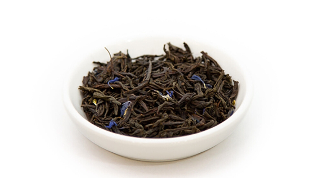 rtny loose earl grey tea in a white bowl